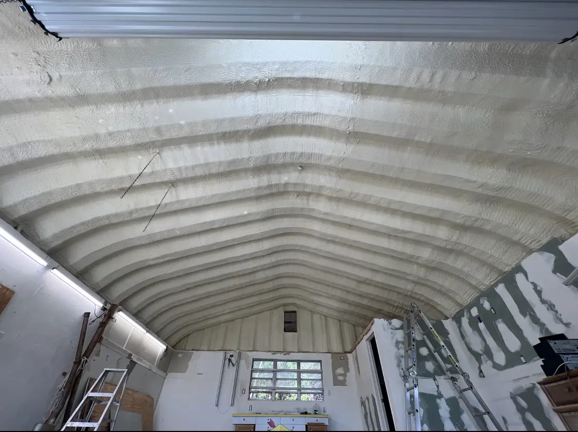 Spray polyurethane foam applied to the underside of a metal roof deck in Grand Ledge